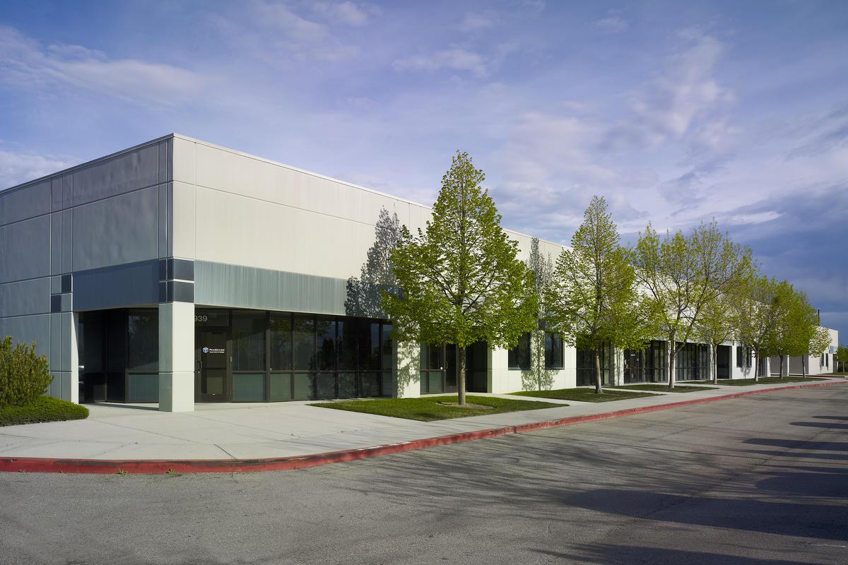 Industrial building storefront shows tenant and accessibility